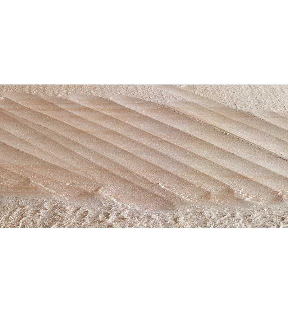 Example of cut on wooden surface after using a scrub plane.