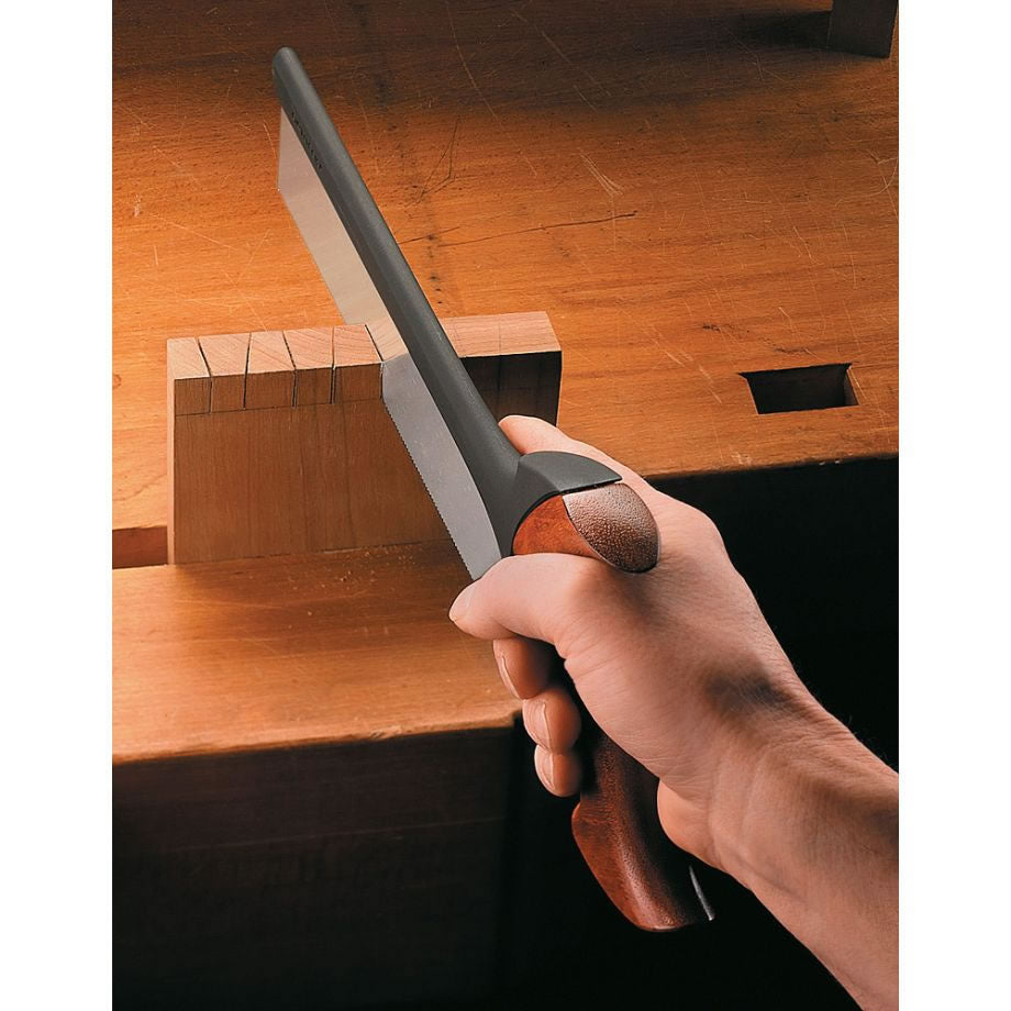 Woodworker cutting dovetails into a piece of timber with the Veritas Standard Dovetail Saw