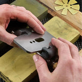 Woodworking sharpening plane blade with the Veritas Side Clamping Honing Guide