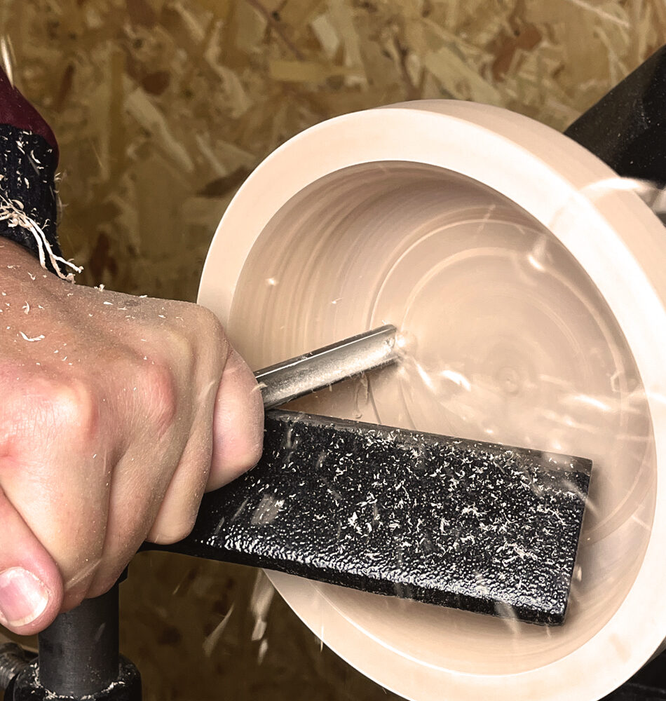 Bowl being turned by wood turner