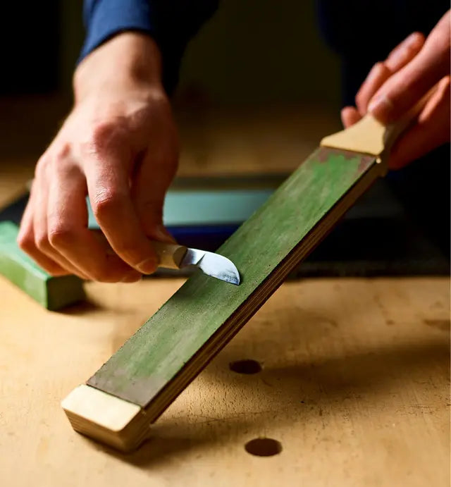 Veritas Double Sided Hand Strop being used to polish chip carving knife