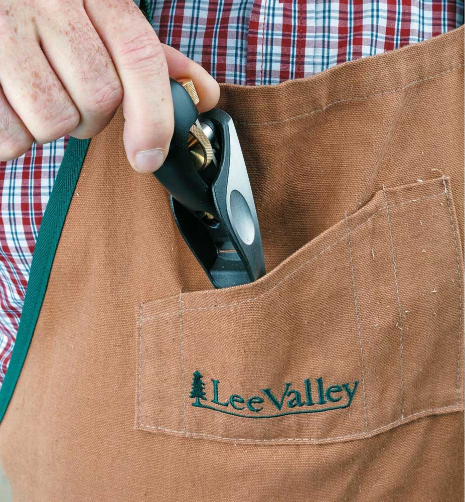 Veritas Pocket Plane being slipped into apron pocket