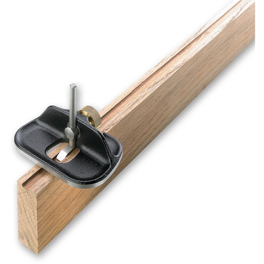 Veritas Small Router Plane displayed cutting groove into workpiece