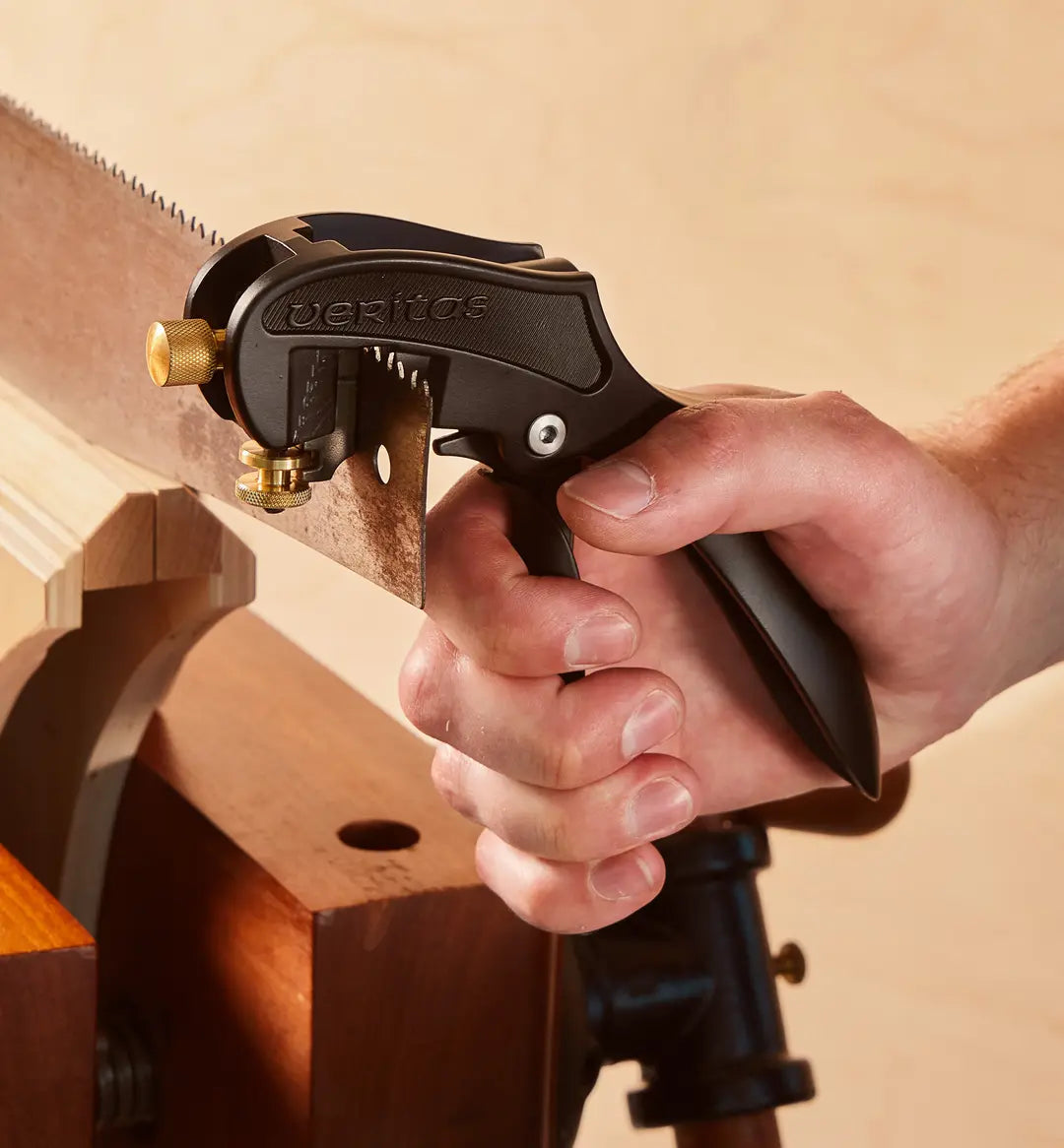 Veritas Saw Set being used to set the teeth on a crosscut hand saw.