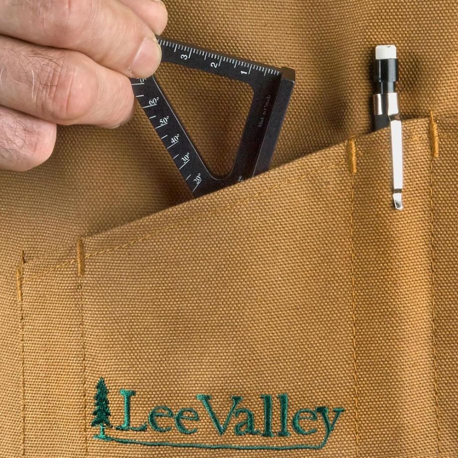 Image of user placing Veritas Pocket Layout Square in pocket