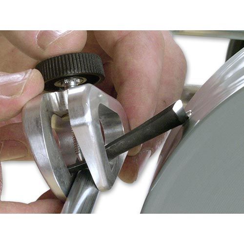 Tormek Short Tool Jig being used to sharpen carving tool