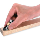 Woodworker holding the Veritas Detail Palm Plane