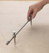 Veritas Beam Compass being used to draw a circle on to Maple board.