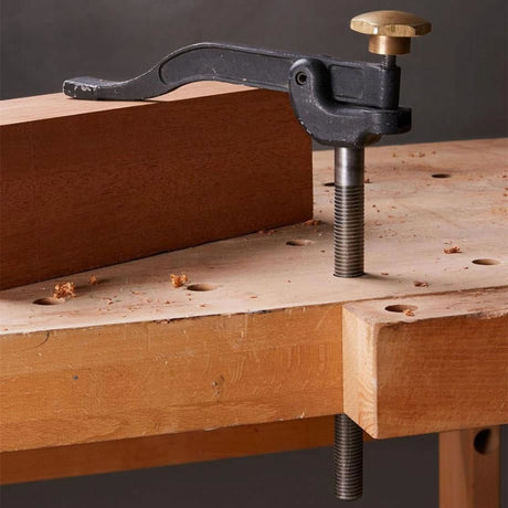 Veritas Bench Hold Down being used to clamp piece of wood in place