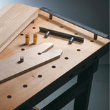 Veritas Round Bench Pups positioned within the workbench