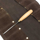 Standard carving chisel positoned on top of the Connell chisel roll, to give idea of sizing.