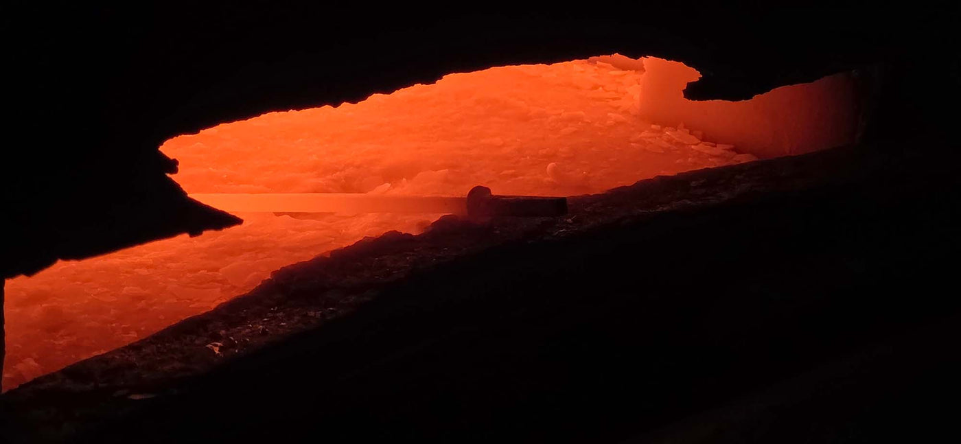A woodcarving tool being heated in Henry Taylors furnace