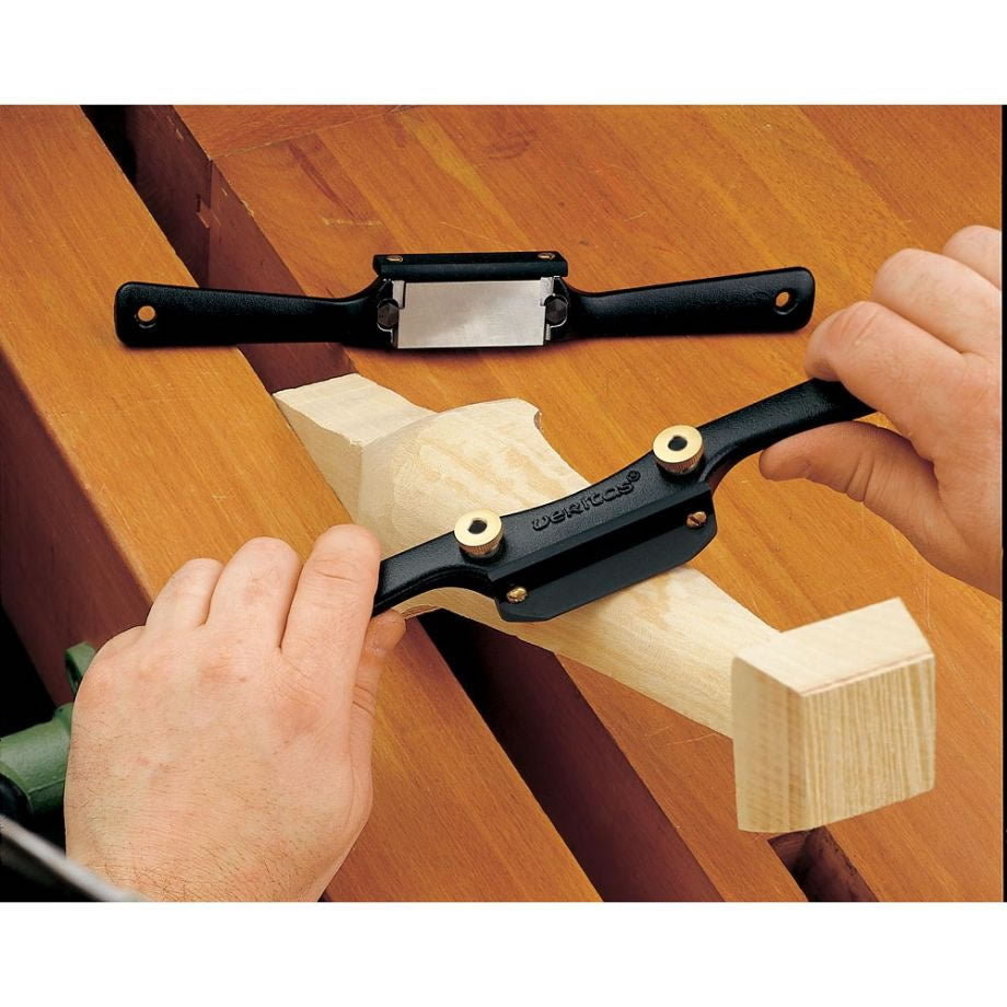 Woodworker using the Veritas Low Angle Spokeshave to clean workpiece