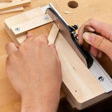 Woodworker using the Veritas Miniature Shooting Board and plane to plane timber