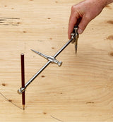 Veritas Beam Compass being used to draw arch into sheet material.