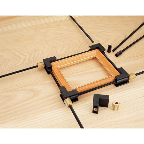 Veritas 4-Way Speed Clamp being used to clamp a picture frame together.