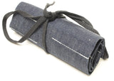 Denim Small Tool Roll that has been rolled up