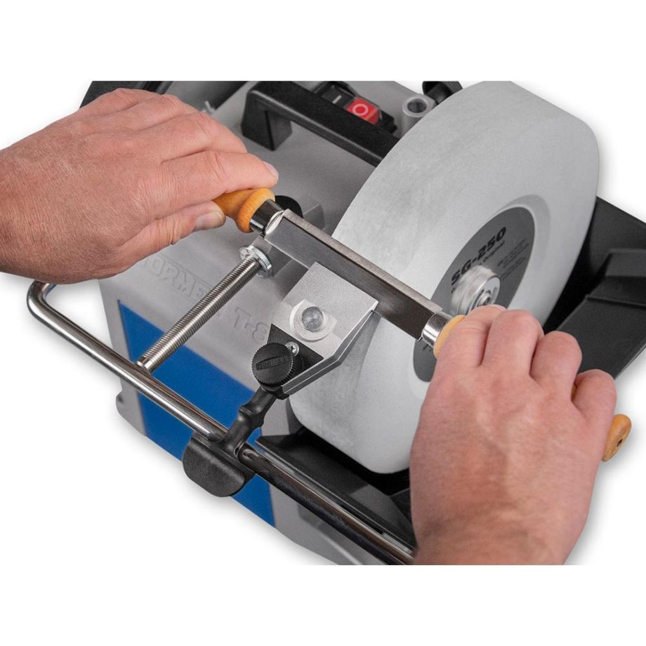 Tormek Centering Drawknife Jig KJ-45 being used to hold a knife in place over the Tormek Grind Wheel