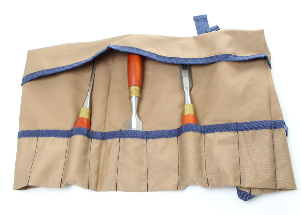 View of tool roll with 3 chisels.