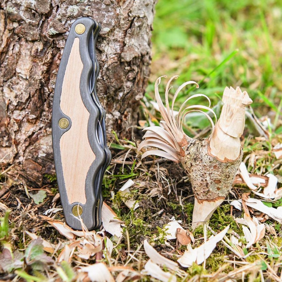 Flexcut Tri Jack Pro displayed next to wood carving