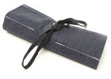 Denim Large Chisel Roll that has been rolled up