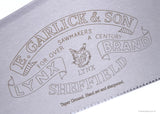 Close up view of saw blade with E.Garlick & Son branding