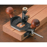 Veritas Router Plane cutting groove into wooden workpiece