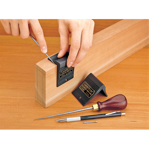 Woodworker marking out wood with a Veritas Saddle Square