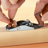 Model Maker using the Veritas Miniature Bench Plane to plane a piece of wood