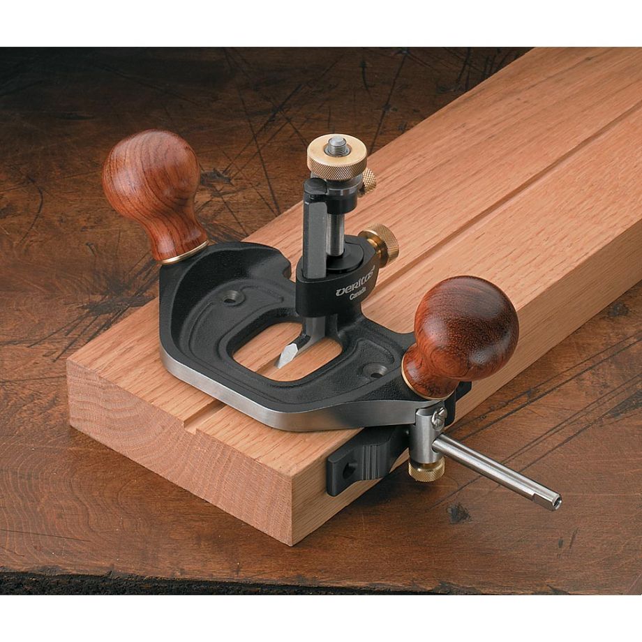 Veritas Router Plane Fence being used on router to cut groove into wood